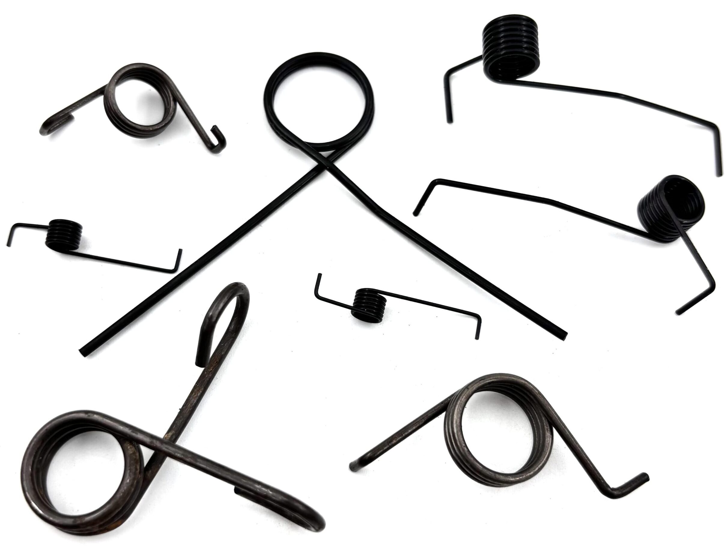 Precision torsion springs for automotive and electronic